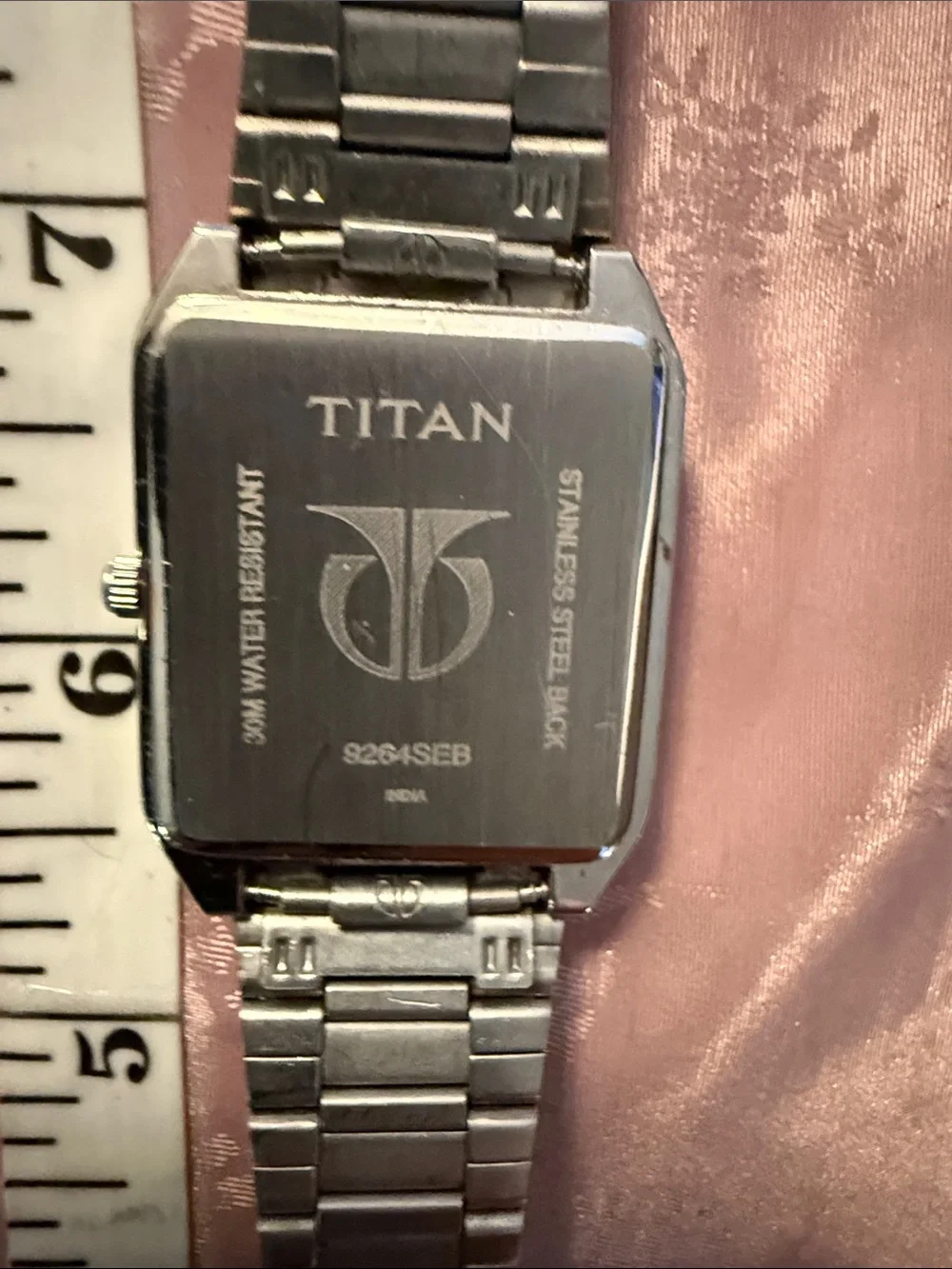 Titan Silver Watch with White Dial in awesome condition new battery